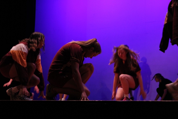 Photograph of three dancers